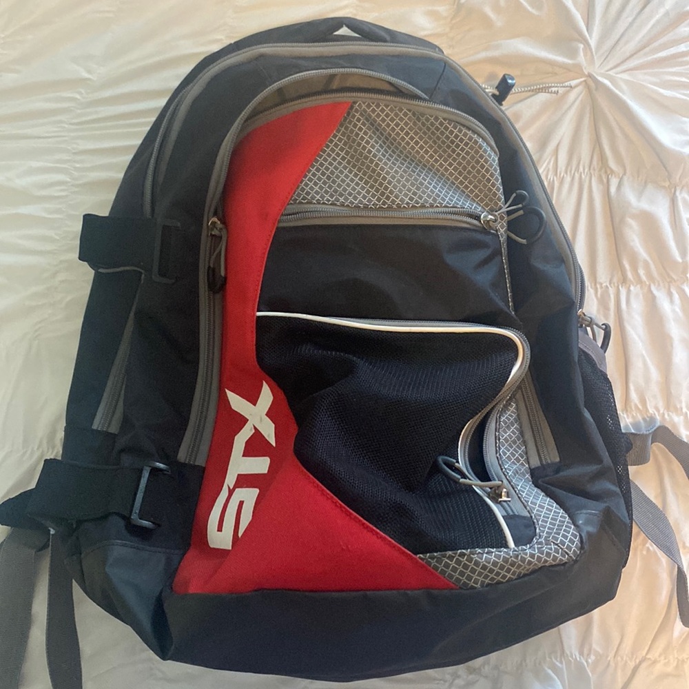 Lightly used STX lacrosse backpack, with stick holder